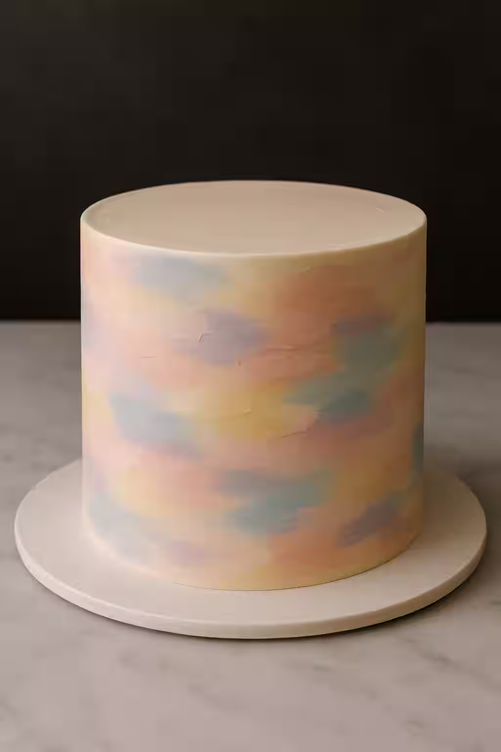 Torta con efecto acuarela en tonos pasteles.